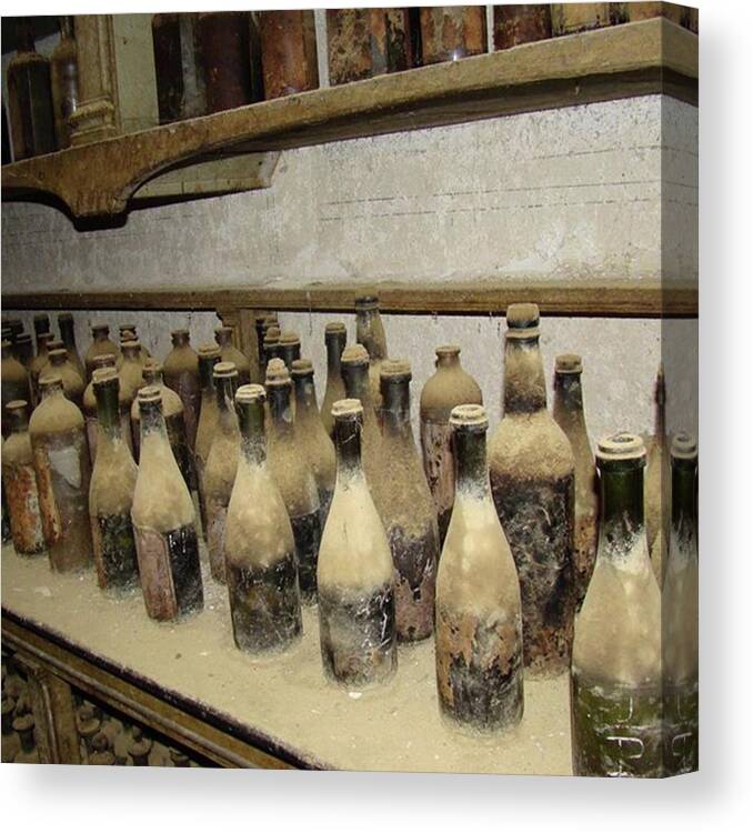 Enjoy Canvas Print featuring the photograph Some Extremely Old Booze At A Bodega In by K S