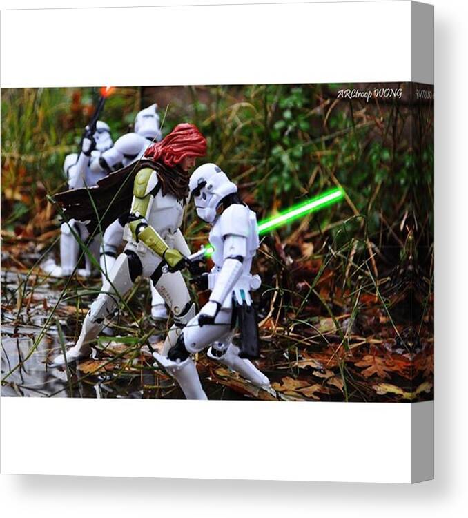 Starwars Canvas Print featuring the photograph Stick Together. Fight Together. Die by Brandon Wong