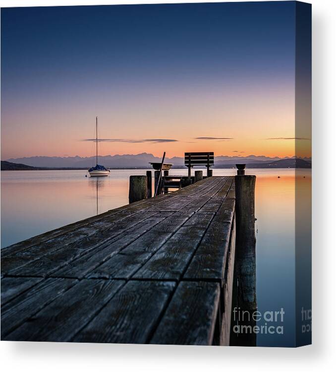 Ammersee Canvas Print featuring the photograph The jetty to sunset by Hannes Cmarits