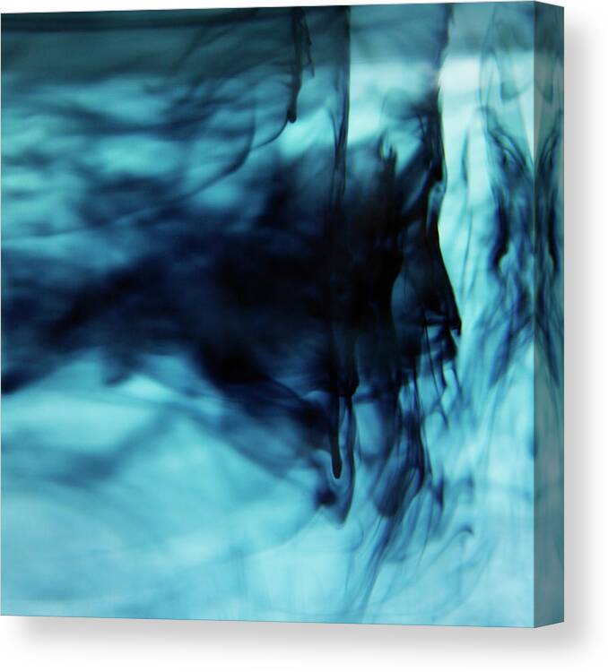 White Background Canvas Print featuring the photograph Blue Ink Swirling In Liquid #2 by Lisbeth Hjort