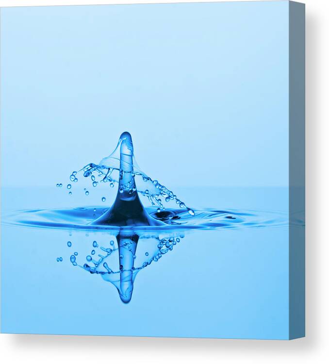 Emergence Canvas Print featuring the photograph A Water Drop Collision And A Hat-like by Kim Westerskov