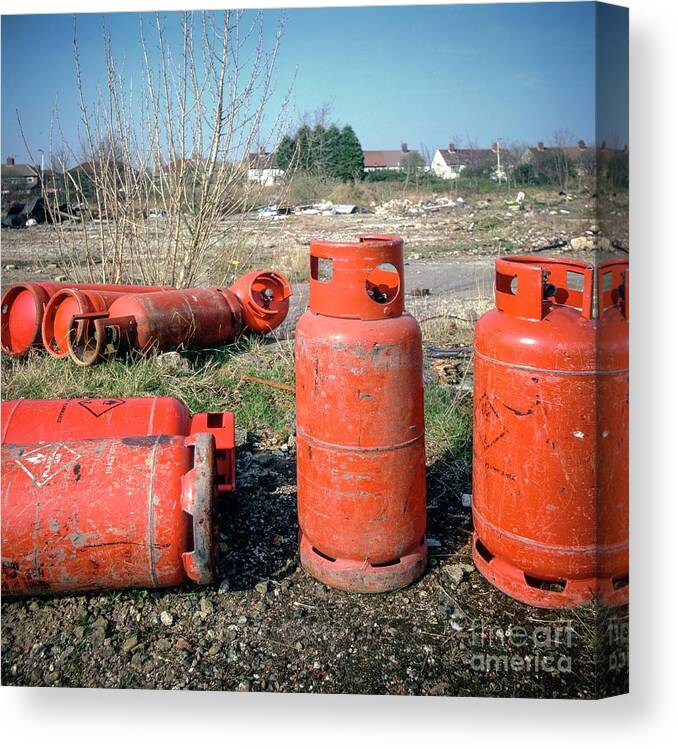 Canister Canvas Print featuring the photograph Abandoned Gas Cylinders by Robert Brook/science Photo Library