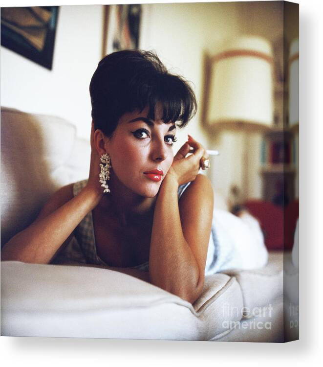 People Canvas Print featuring the photograph Actress Joan Collins Reclining by Bettmann