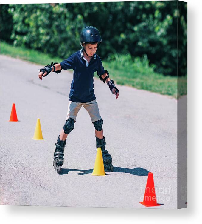 Roller Canvas Print featuring the photograph Boy Learning To Roller Skate by Microgen Images/science Photo Library