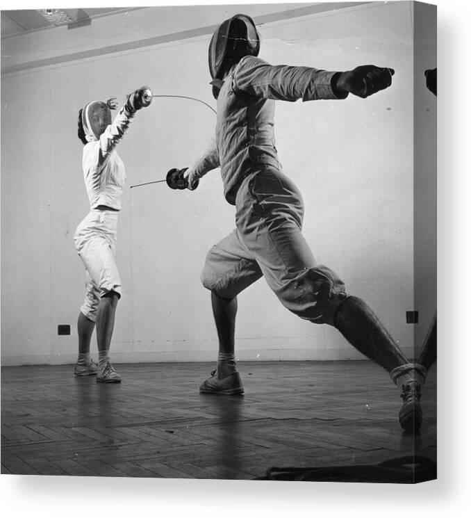 Foil Fencing Canvas Print featuring the photograph Fencers Training by Thurston Hopkins