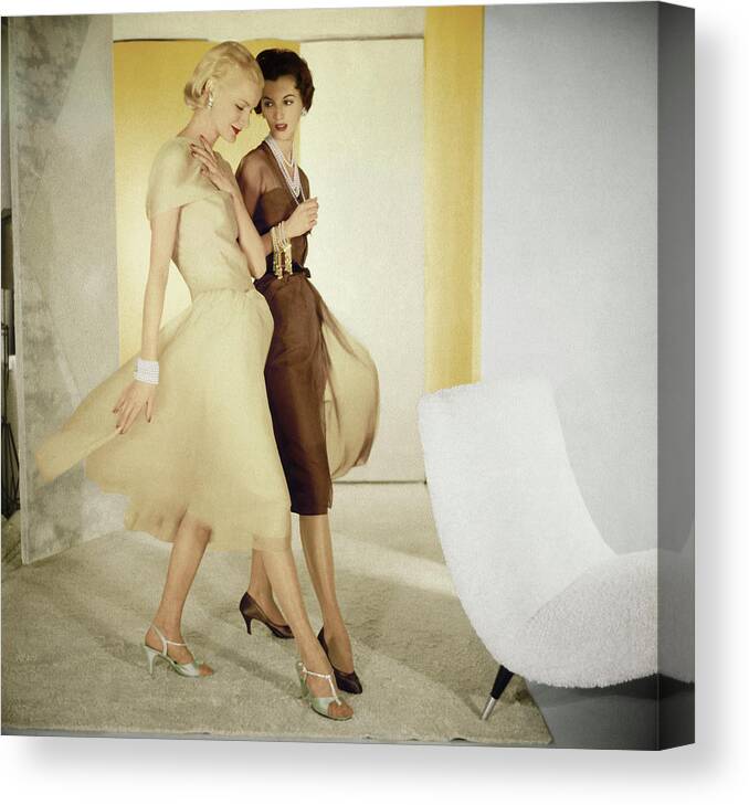 Indoors Canvas Print featuring the photograph Models Wearing Silk Chiffon Dresses by Horst P Horst
