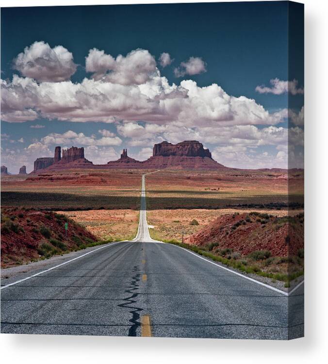 Tranquility Canvas Print featuring the photograph Monument Valley by Brusselsimages