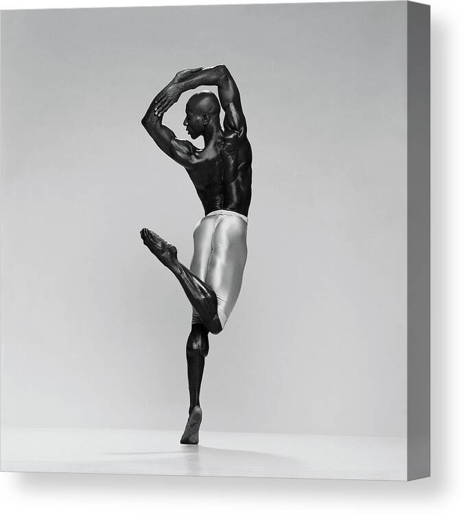 White Background Canvas Print featuring the photograph Rear View Of Male Dancer Standing On by Chris Nash