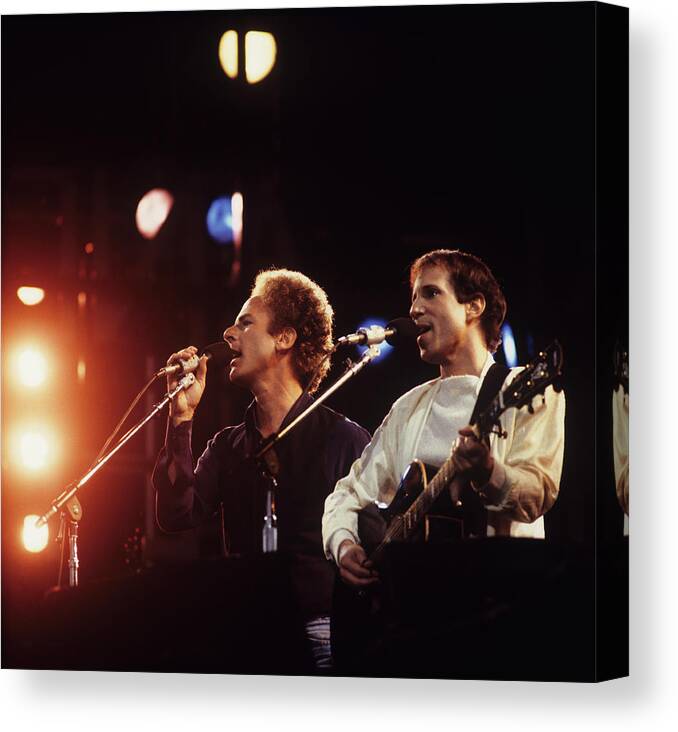 Singer Canvas Print featuring the photograph Simon And Garfunkel Perform In London by David Redfern