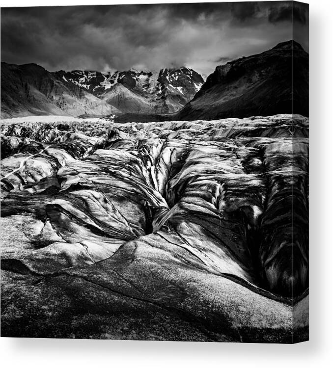 Black Canvas Print featuring the photograph The Black Glacier by George Digalakis