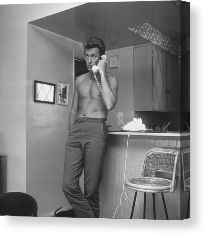People Canvas Print featuring the photograph Topless Clint by Hulton Archive