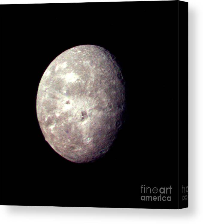 Voyager Imagery Canvas Print featuring the photograph Uranus's Moon Oberon by Nasa/science Photo Library