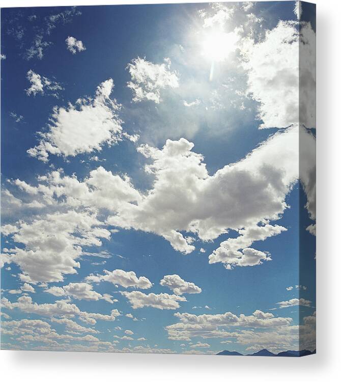 Outdoors Canvas Print featuring the photograph White Clouds Over Mountain Range by Paul Taylor