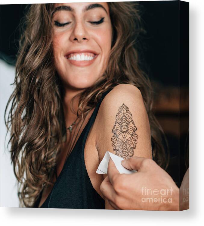 Tattoo Canvas Print featuring the photograph Woman With Temporary Tattoo by Microgen Images/science Photo Library