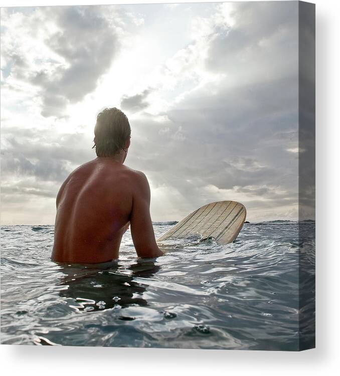 People Canvas Print featuring the photograph Young Man On Surfboard In Water Looking by Siri Stafford