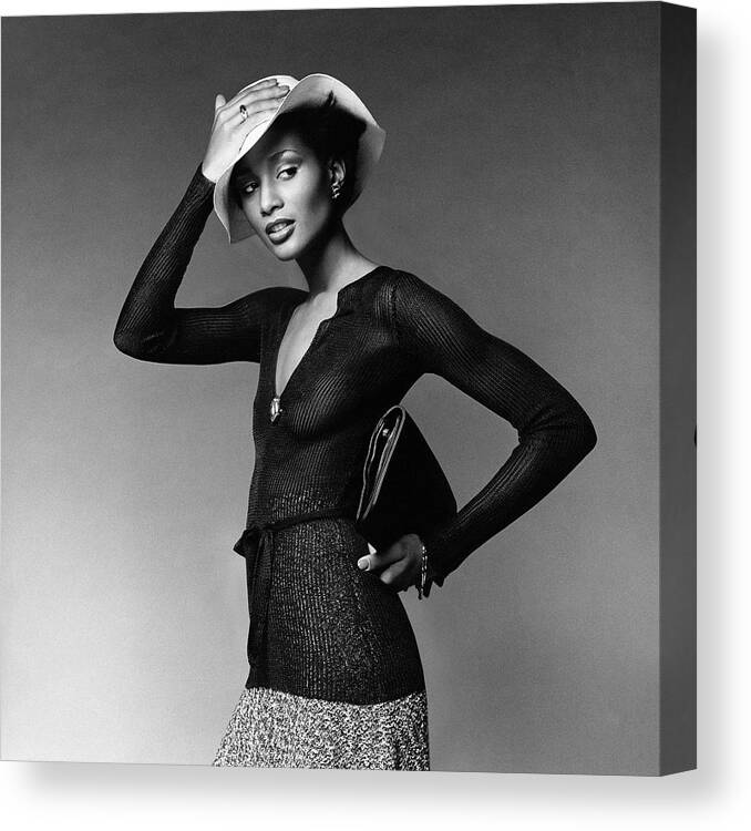 Accessories Canvas Print featuring the photograph Beverly Johnson Wearing A Sheer Ribbed Pullove by Francesco Scavullo