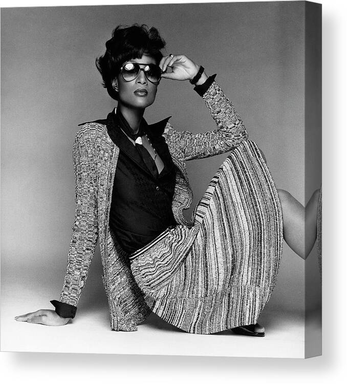 Accessories Canvas Print featuring the photograph Beverly Johnson Wearing Kasper Sweater Set by Francesco Scavullo