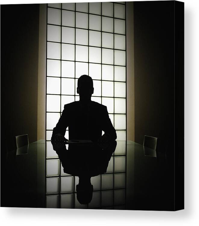 Interrogation Canvas Print featuring the photograph Business man or boss in silhouette interview by John Rensten