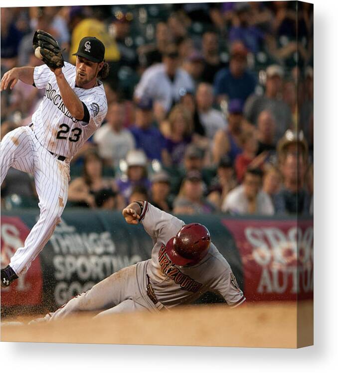 Catching Canvas Print featuring the photograph Charlie Culberson and Martin Prado by Dustin Bradford