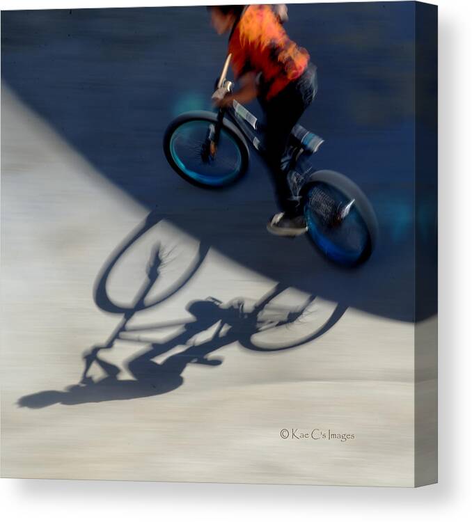 Bike Canvas Print featuring the photograph Cyclist and His Shadow by Kae Cheatham