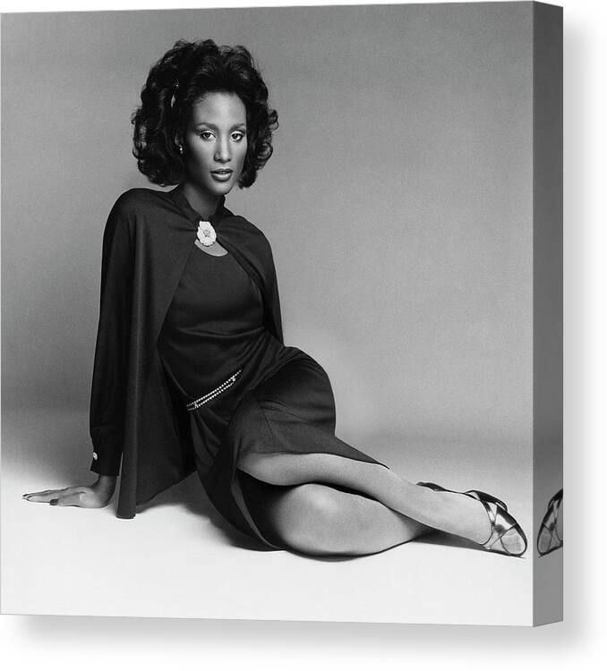 Accessories Canvas Print featuring the photograph Model Beverly Johnson Wearing Adele Simpson Dress by Francesco Scavullo
