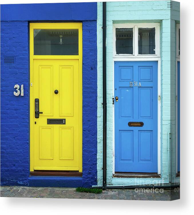London Canvas Print featuring the photograph Yellow and blue doors in London by Delphimages London Photography
