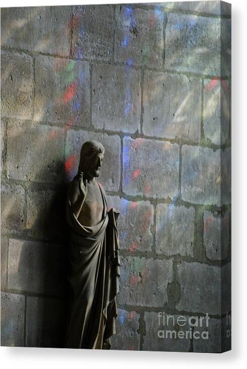 Notre Dame Canvas Print featuring the photograph Stained glass illuminates Christ by Christine Jepsen