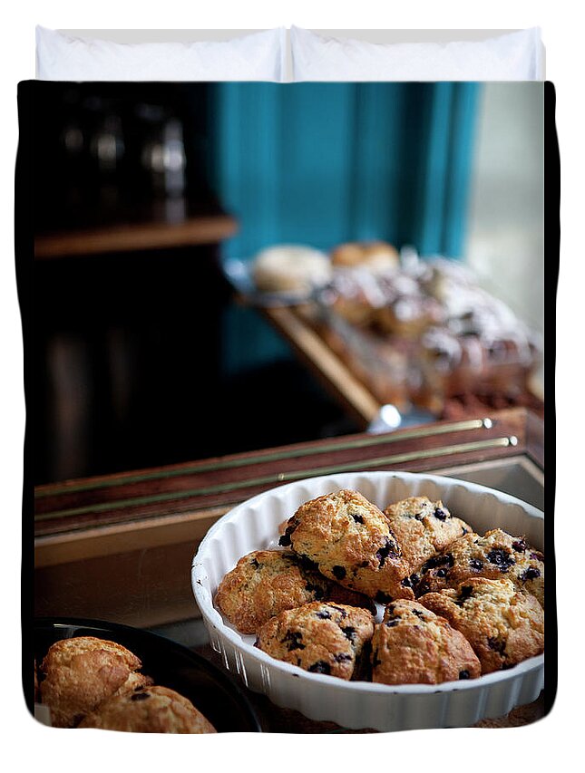 Breakfast Duvet Cover featuring the photograph A Variety Of Scones For Sale On Display #1 by Halfdark