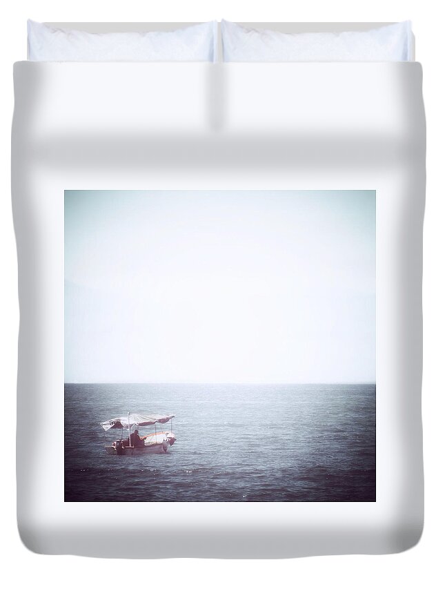 Ocean Duvet Cover featuring the photograph El Pescador Solitario #2 by Natasha Marco