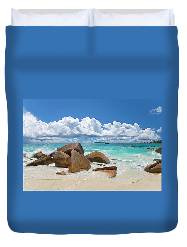 Water's Edge Duvet Cover featuring the photograph Granite Boulders On The Shore At Anse #1 by David C Tomlinson