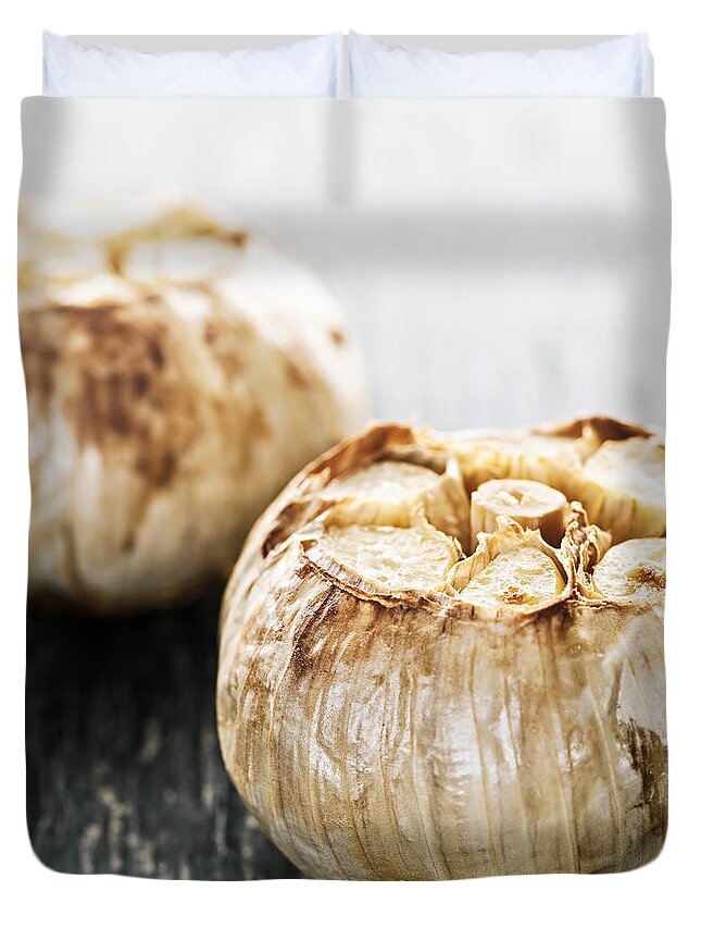 Garlic Duvet Cover featuring the photograph Roasted garlic bulbs 2 by Elena Elisseeva