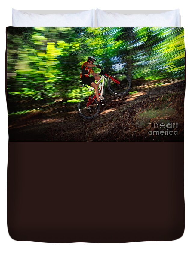 New England Duvet Cover featuring the photograph Young man mountain biking in a forest Stowe VT USA #3 by Don Landwehrle