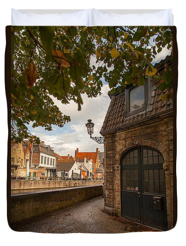 Architecture Duvet Cover featuring the photograph A corner in Bruges by W Chris Fooshee