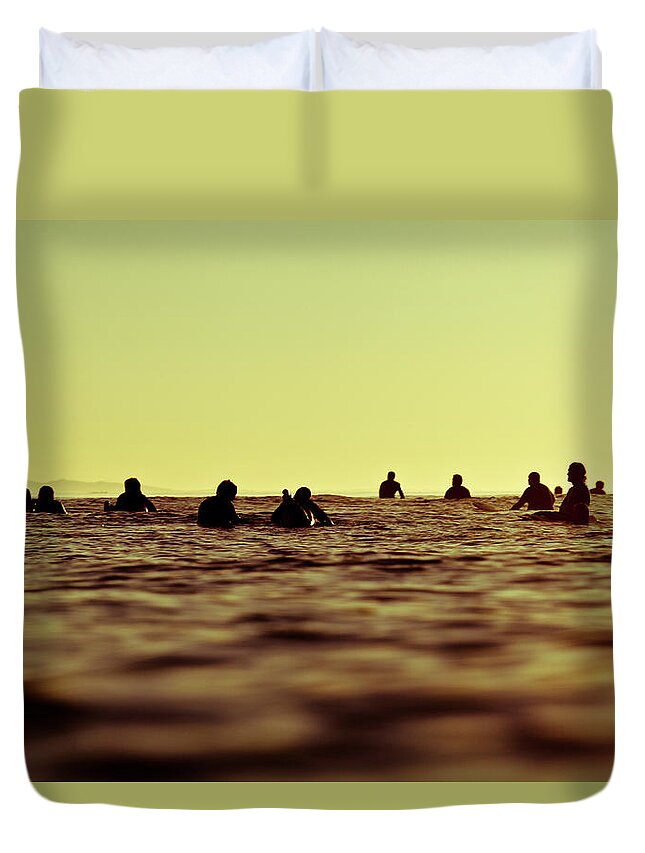 Adventure Duvet Cover featuring the photograph A Group Of Surfers Wait For Waves by Kyle Sparks