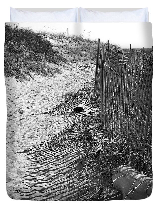 Beach Retaining Fence Duvet Cover featuring the photograph A Stroll In The Sand by Jeff Folger