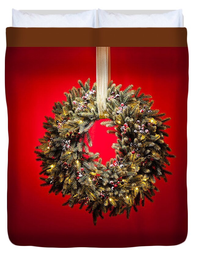 Advent Duvet Cover featuring the photograph Advent wreath over red background by U Schade