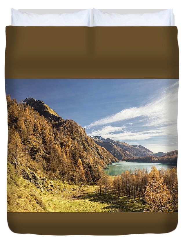 Tranquility Duvet Cover featuring the photograph Alpine Lake In A Larches Forest by Buena Vista Images
