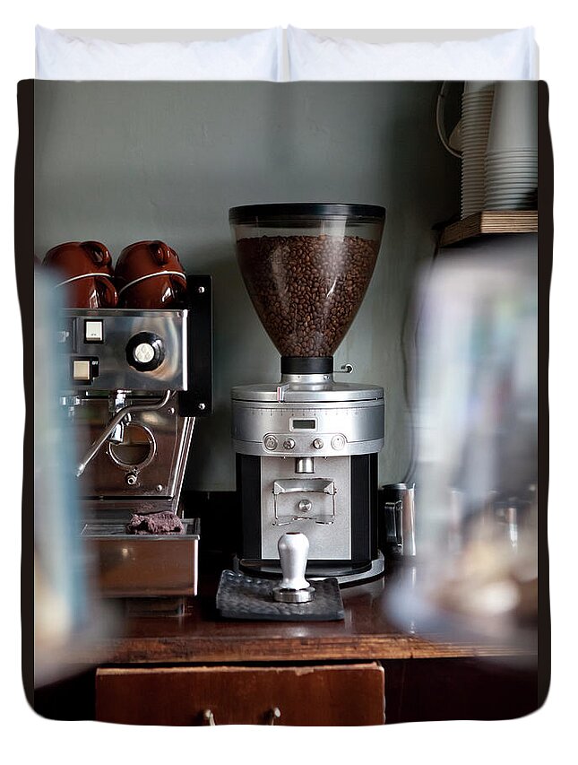 Berlin Duvet Cover featuring the photograph An Coffee Bean Grinder Next To An by Halfdark