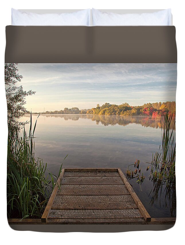 Tranquility Duvet Cover featuring the photograph Autumnal Sunrise Across The Lake by Ray Wise