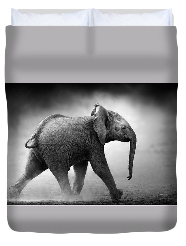 Elephant Duvet Cover featuring the photograph Baby Elephant running by Johan Swanepoel