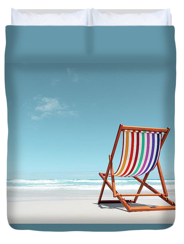 Tranquility Duvet Cover featuring the photograph Beach Chair With Rainbow Stripes by John White Photos