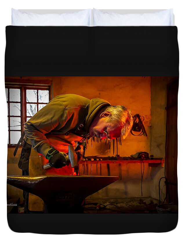 Blacksmith In Torresta Duvet Cover featuring the photograph Blacksmith in Torresta by Torbjorn Swenelius