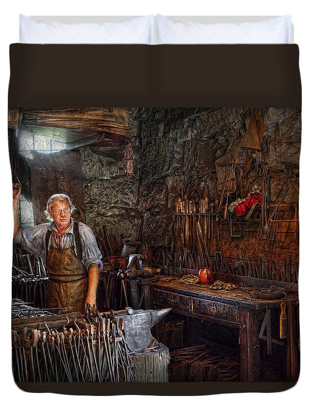 Blacksmith Duvet Cover featuring the photograph Blacksmith - Working the forge by Mike Savad