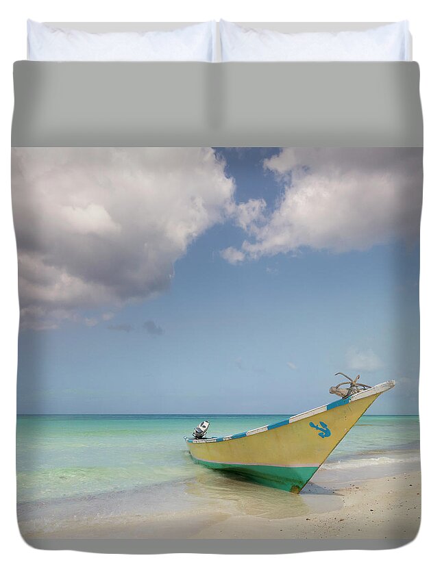 Tranquility Duvet Cover featuring the photograph Boat Moored On Beach by John M Lund Photography Inc