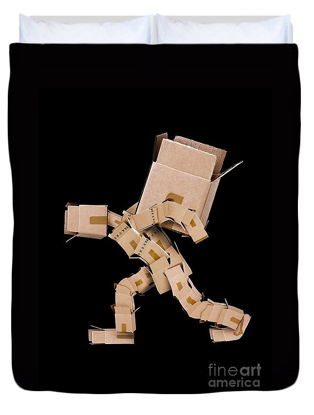 Strength Duvet Cover featuring the photograph Box character carrying large box by Simon Bratt