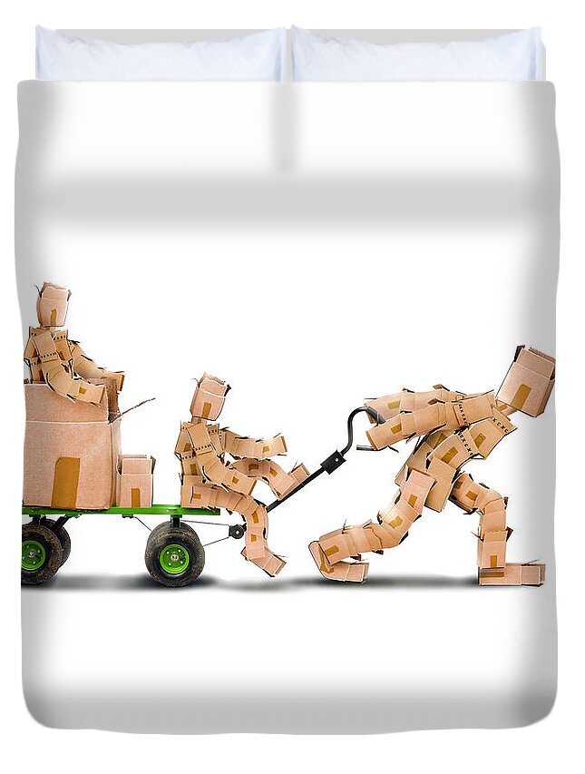Outside Duvet Cover featuring the photograph Box character pulling boxkids on trolley by Simon Bratt