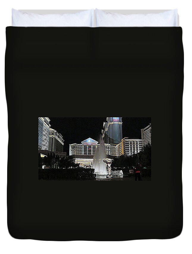 Night-shot Duvet Cover featuring the photograph Caesars Palace by Kay Novy