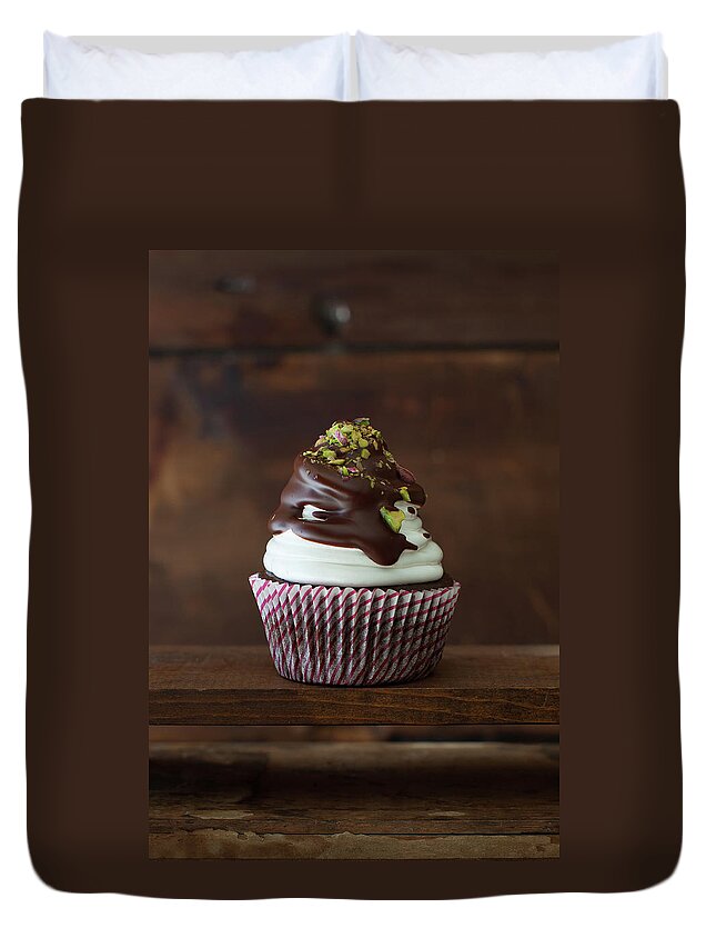 Newtown Duvet Cover featuring the photograph Chocolate Cupcake by Yelena Strokin