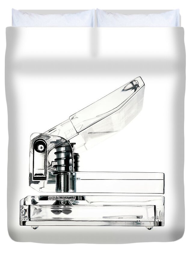 White Background Duvet Cover featuring the photograph Clear Hole Puncher On A White Background by Peter Dazeley