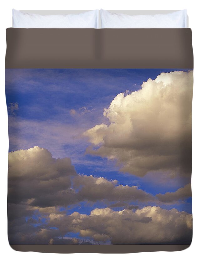 00170086 Duvet Cover featuring the photograph Colorful Clouds Against Blue Sky by Tim Fitzharris